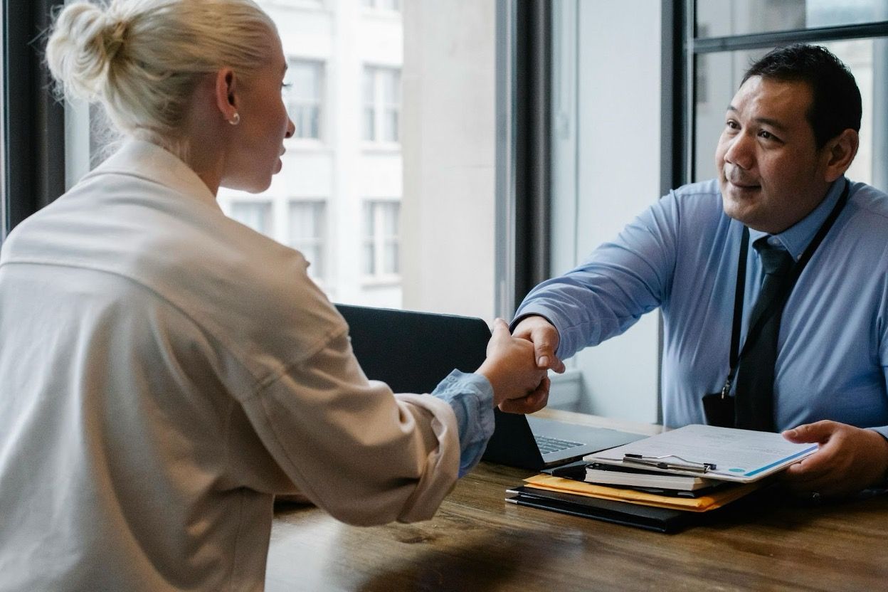 Professional discussing debt relief options with a client