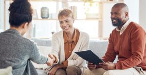 Handshake, accountant or happy black couple with financial advisor for success investment, savings .