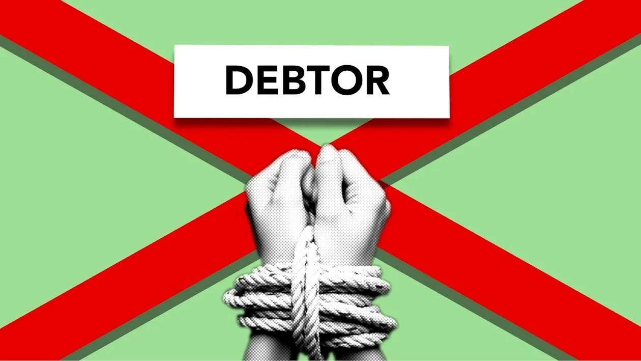 Hands tied with rope under a "DEBTOR" sign, symbolizing the struggle of being in debt and the need for effective debt consolidation.